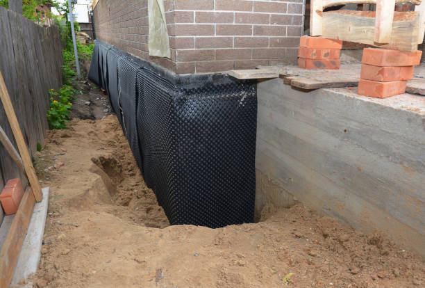 SJ Waterproofing Pros technician performing targeted Emergency Waterproofing assessment in Goodland, KS